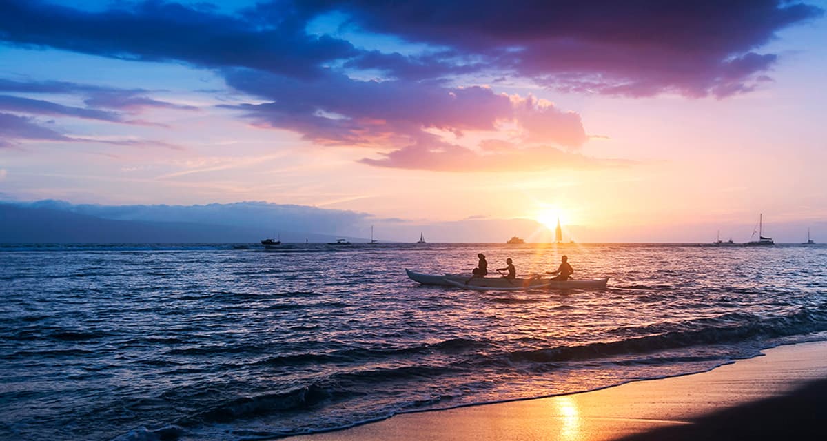 Canoe paddlers on the Pacific Ocean on West Maui, Hawaii.